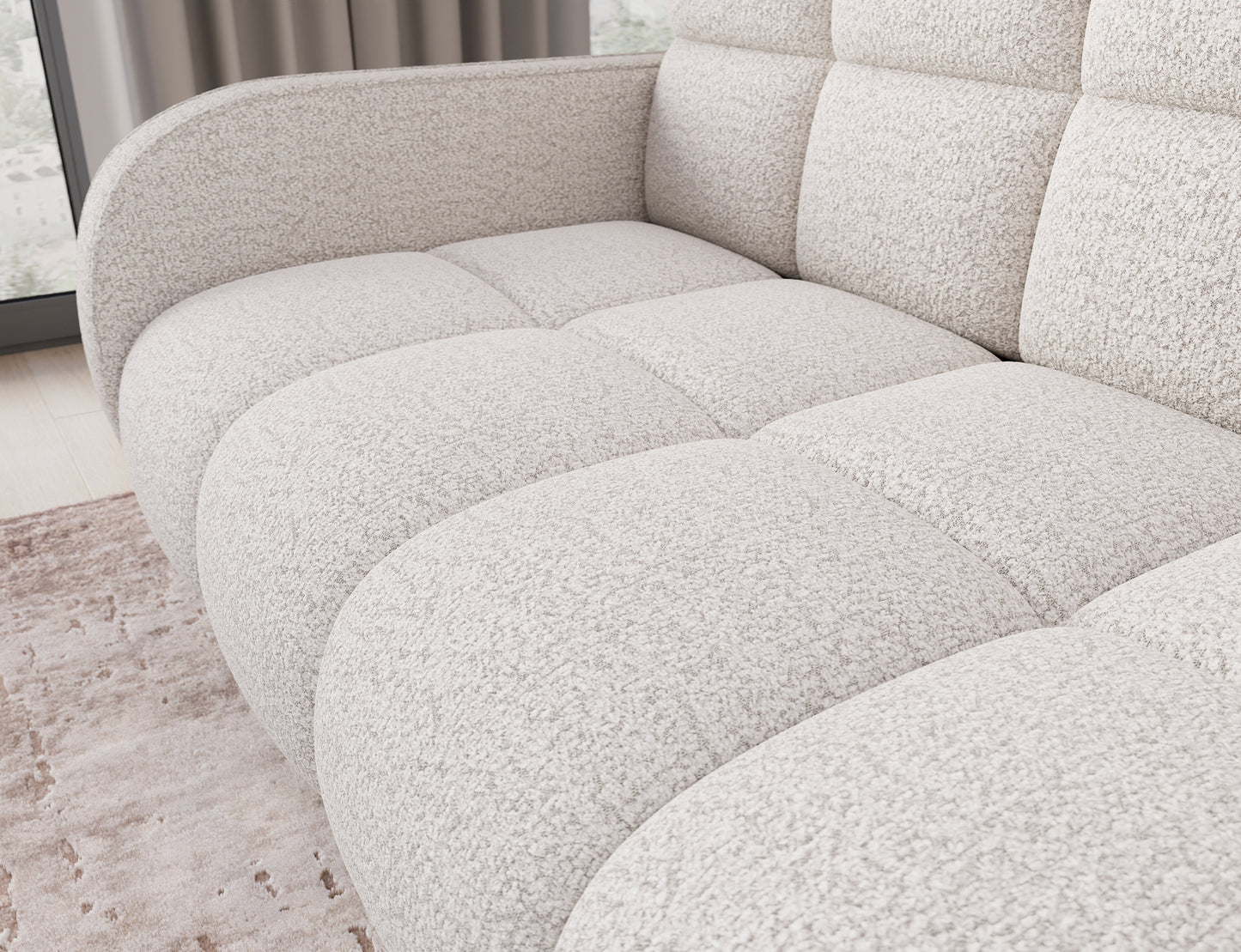 Sofa Deverio Royal 01 biały boucle – detal siedziska z miękką strukturą i przeszyciami podkreślającymi komfort użytkowania.