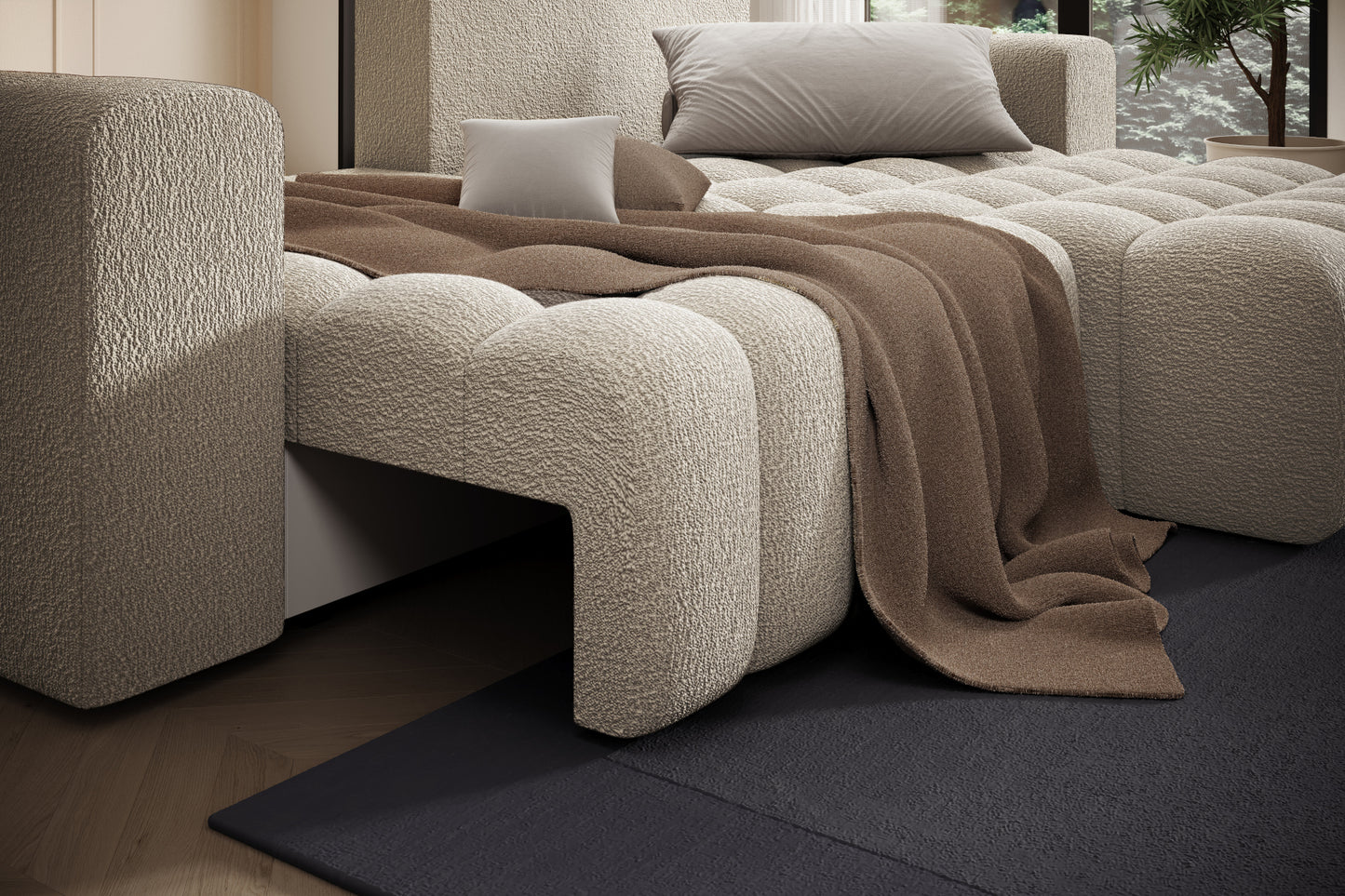 Detal oparcia i przeszyć tapicerki sofy Bonett w tkaninie Royal 20 beżowy, układ prawy.