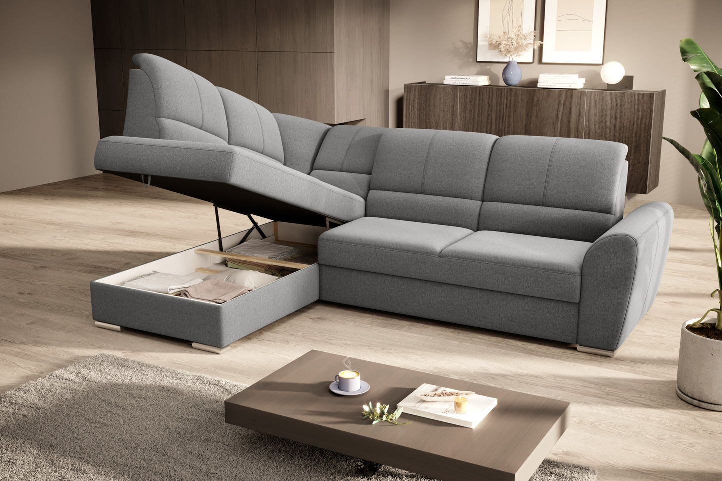 Duży narożnik Siber lewy w tkaninie Gojo 05 w kolorze szarym to komfortowa sofa wypoczynkowa, która łączy funkcjonalność z eleganckim i ponadczasowym stylem wnętrza.