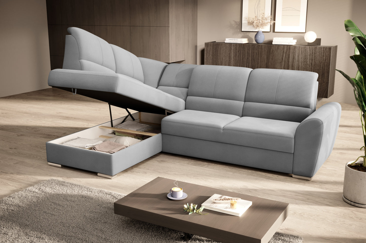 Duży narożnik Siber lewy w tkaninie Nube 03 w kolorze jasnoszarym to komfortowa sofa wypoczynkowa, która łączy funkcjonalność z eleganckim i uniwersalnym wyglądem wnętrza.