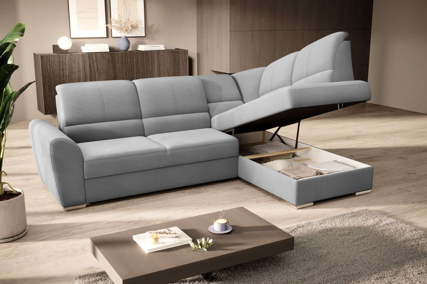 Duży narożnik Siber prawy w tkaninie Nube 03 w kolorze jasnoszarym to komfortowa sofa wypoczynkowa do salonu, która rozjaśnia przestrzeń i zapewnia wygodę całej rodzinie.
