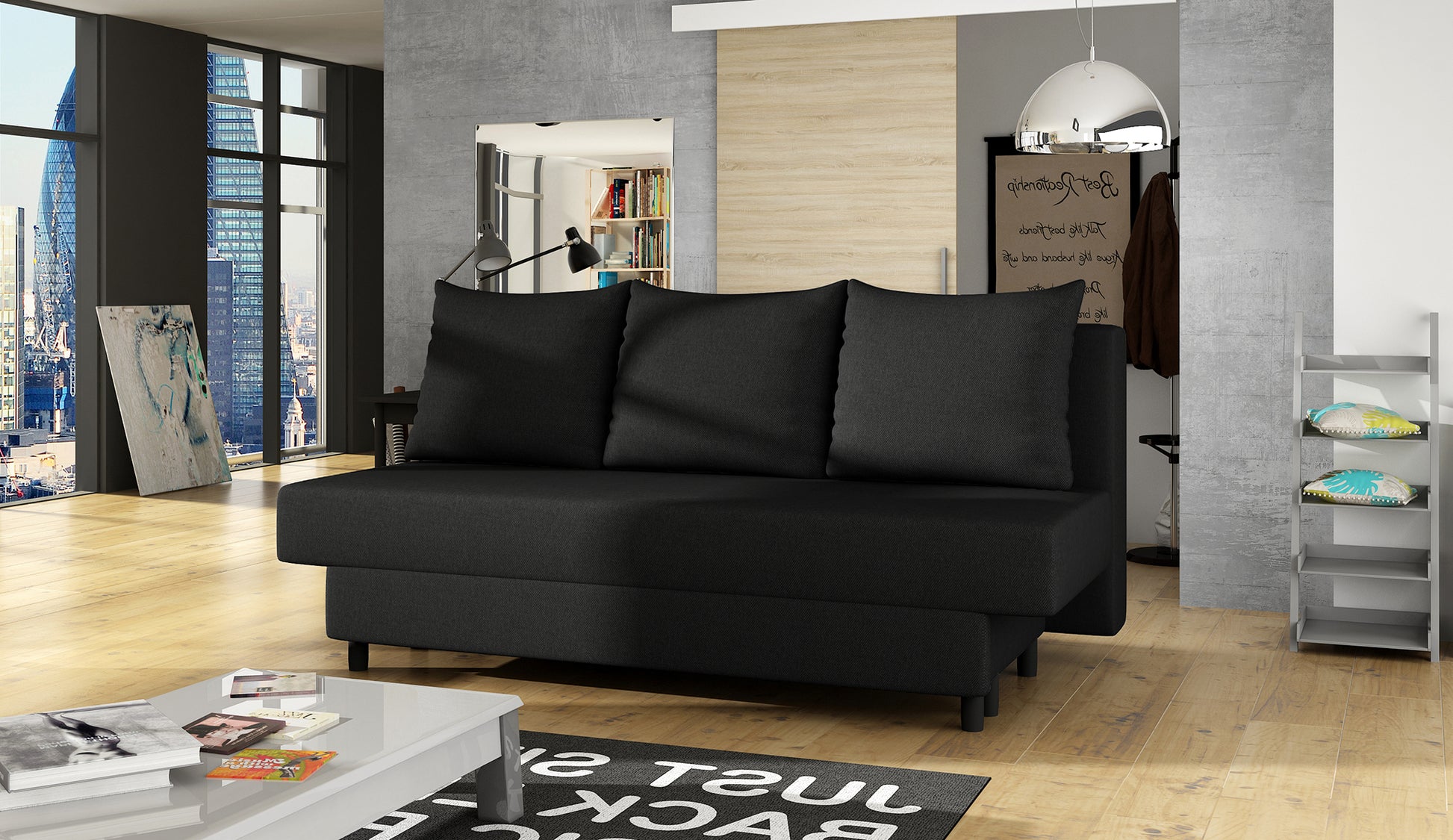Kanapa Amaza Sawana 14 czarny w nowoczesnym salonie z dużymi oknami i designersznymi dodatkami.