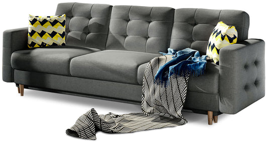 Kanapa Asgard w kolorze Sawana 21 szary z poduszkami w tkaninie Zigzag 53 wielokolorowej – elegancka sofa trzyosobowa z pikowanym oparciem i drewnianymi nogami.