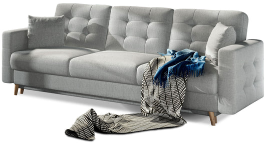 Kanapa Asgard w kolorze Solid 09 beżowy – elegancka sofa trzyosobowa z pikowanym oparciem, miękkimi poduszkami i drewnianymi nogami.