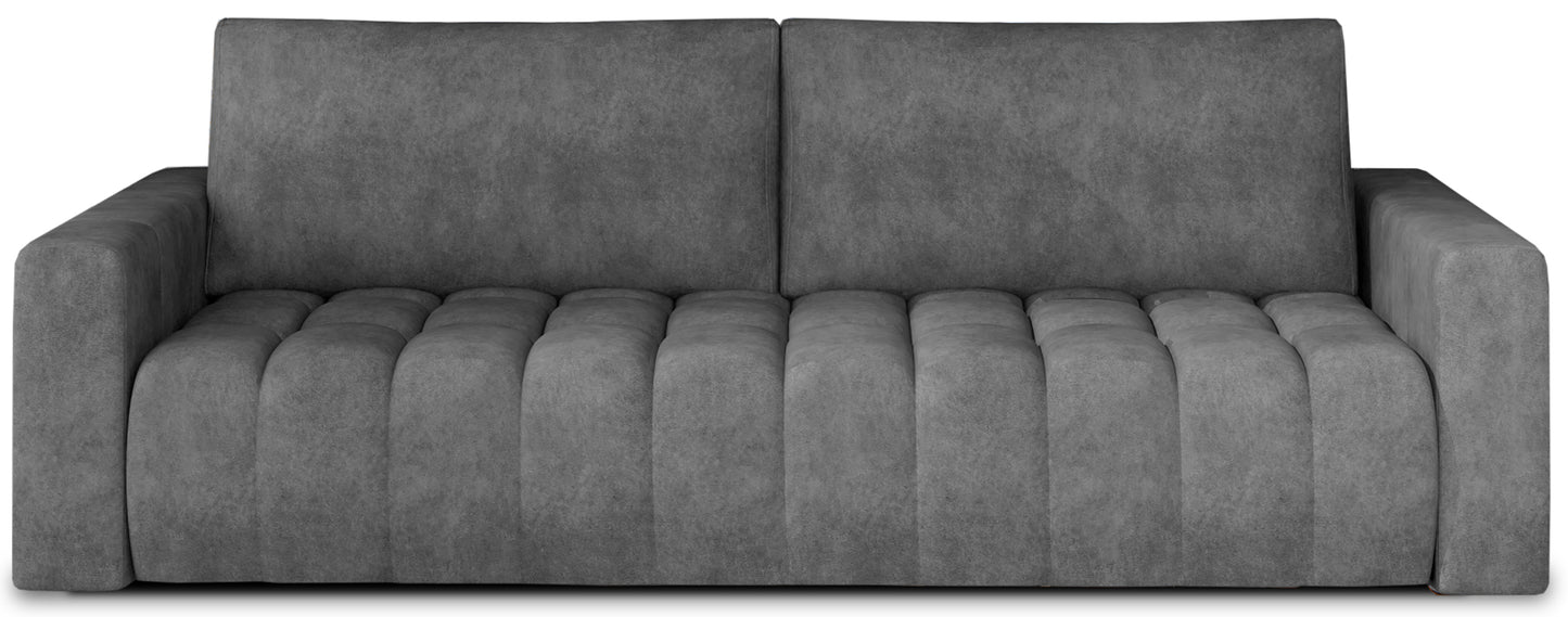 Sofa Lazaro Dora 95 ciemnoszary – frontowe ujęcie na białym tle, pikowane siedzisko z wyraźnymi pionowymi przetłoczeniami, niskie, proste oparcie i masywne, prostokątne podłokietniki.