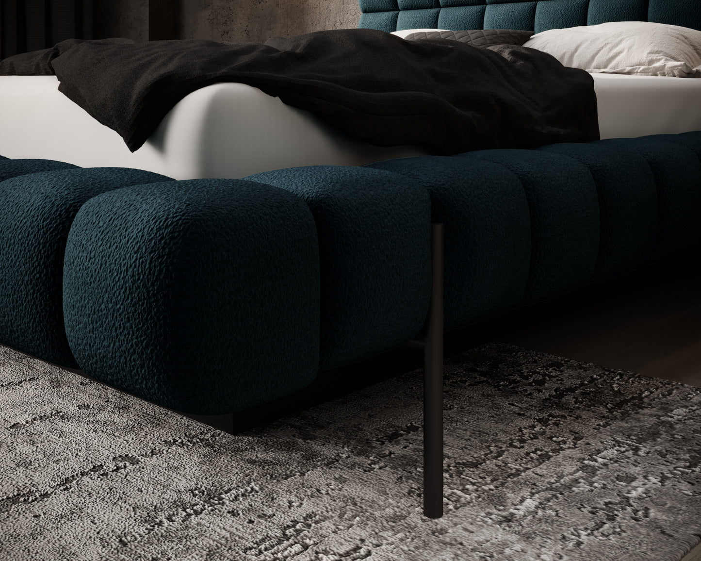 Narożnik łóżka Magentta w tkaninie Amore 40 granatowy z detalem metalowej nogi i pikowanego wykończenia.
