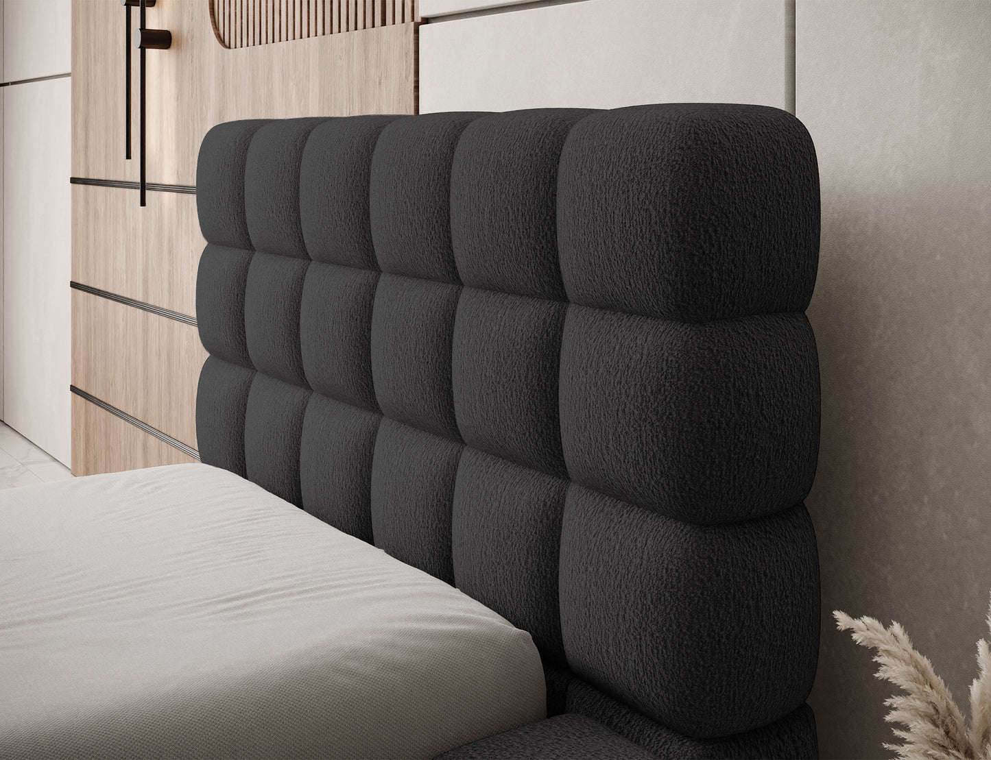 Zagłówek łóżka Dizzle I 90x200 w tkaninie Royal 05 ciemnoszary, detal przeszyć i miękkiej tapicerki.