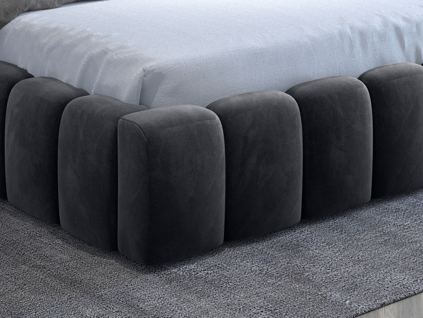 Detal zaokrąglonych modułów tapicerowanej podstawy łóżka Lamica II Monolith 85 szary.