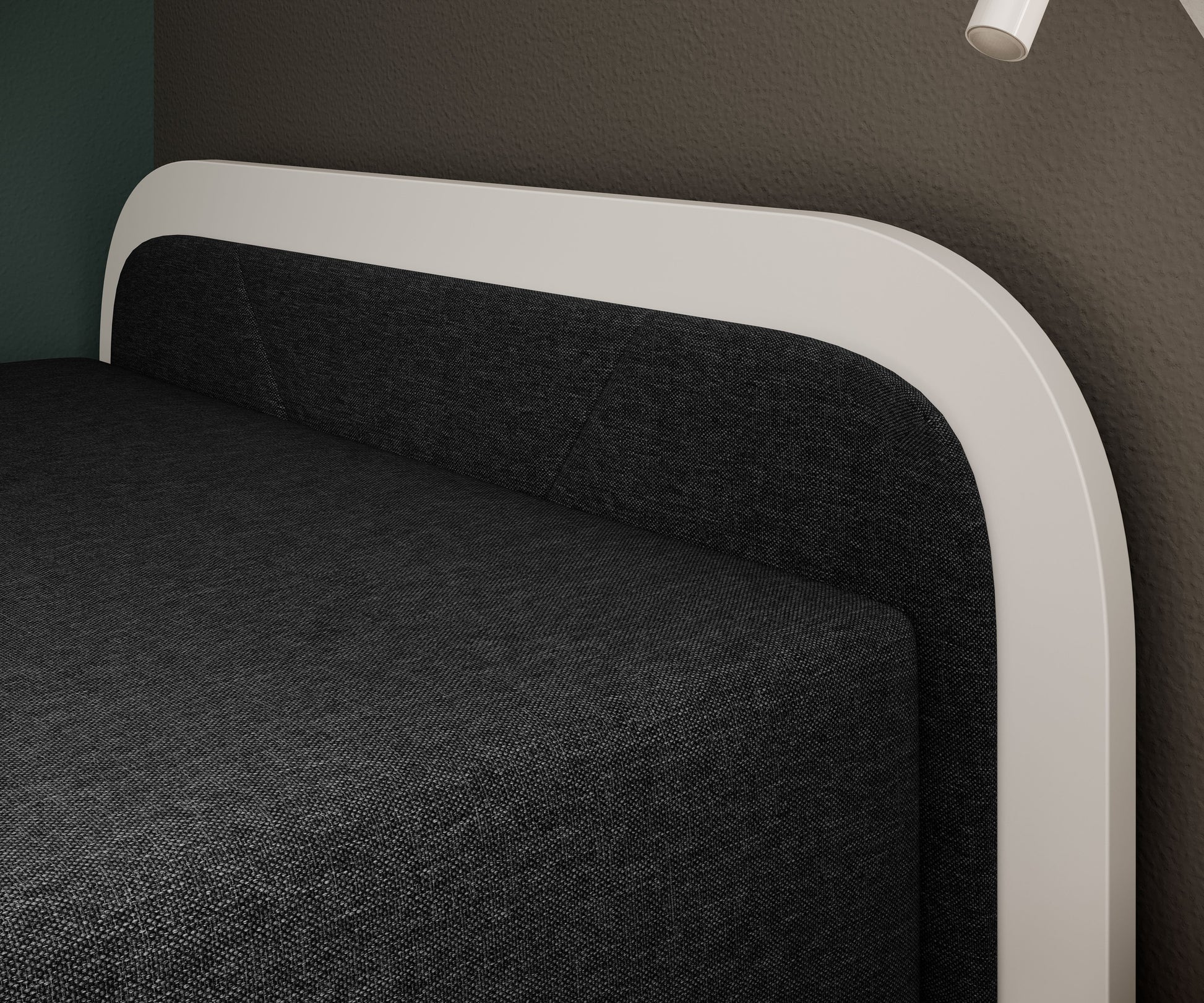 Zbliżenie na tapicerowany zagłówek łóżka Parys I w Sawana 14 czarny, otoczony białą ramą, z widocznymi przeszyciami.