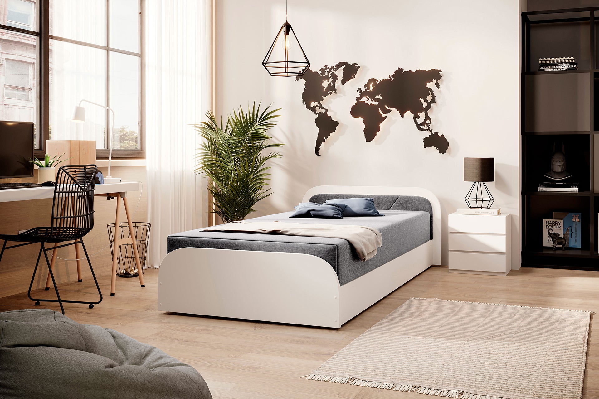 Perspektywa z pufą w pierwszym planie i łóżkiem Parys I w Sawana 21 szary, prawy układ, przy biurku z metalowym krzesłem.