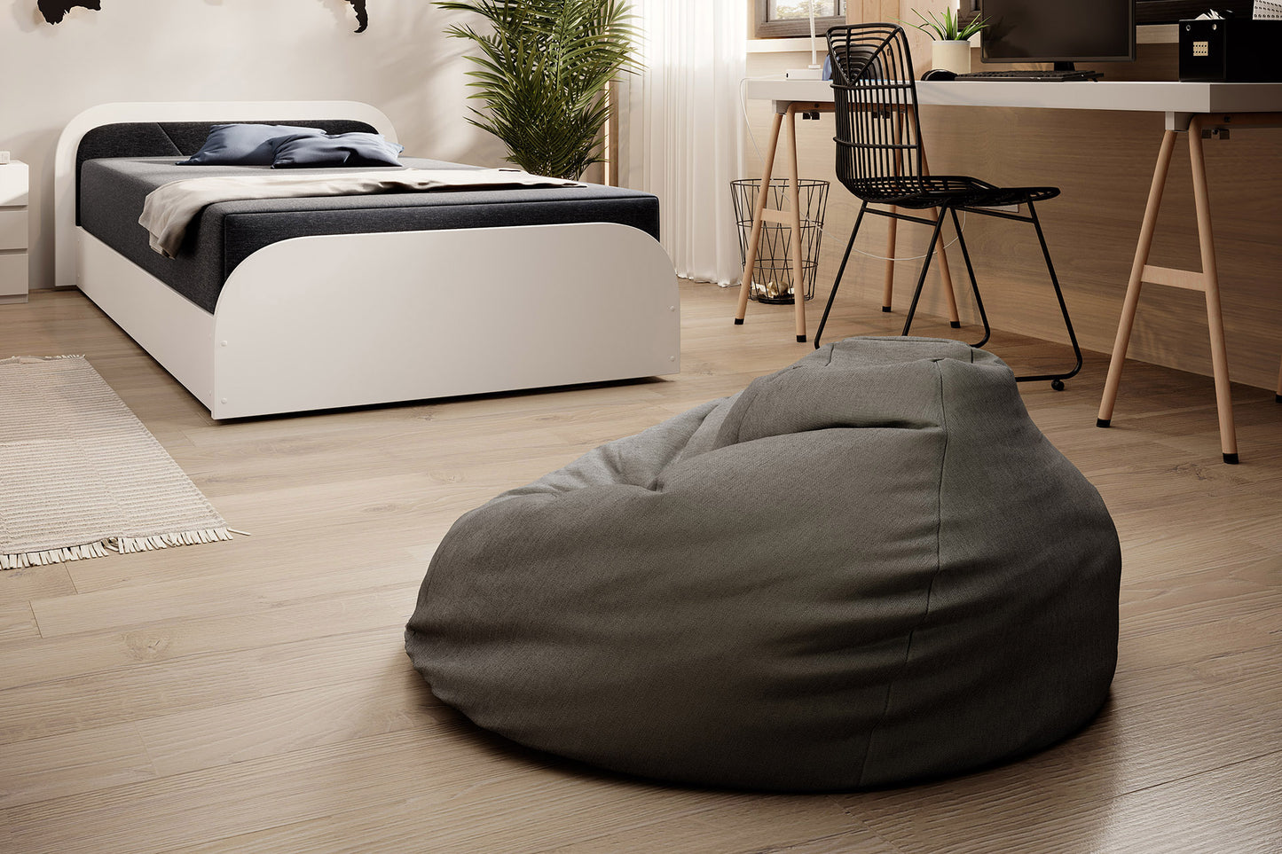 Łóżko Parys II Sawana 05 ciemnoszary układ lewy w tle biurka i pufy, nowoczesne wykończenie wnętrza.