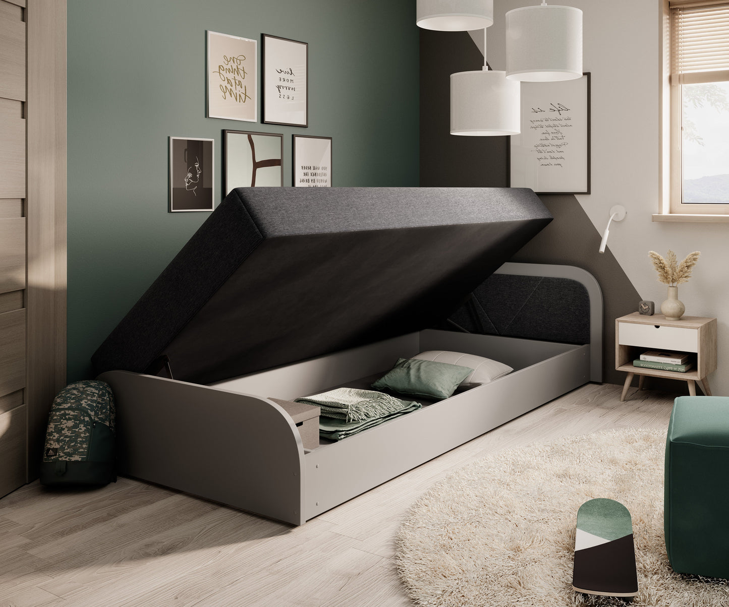 Łóżko Parys II Sawana 05 ciemnoszary (układ prawy) z unoszonym materacem odsłaniającym pojemną szufladę na pościel i akcesoria.