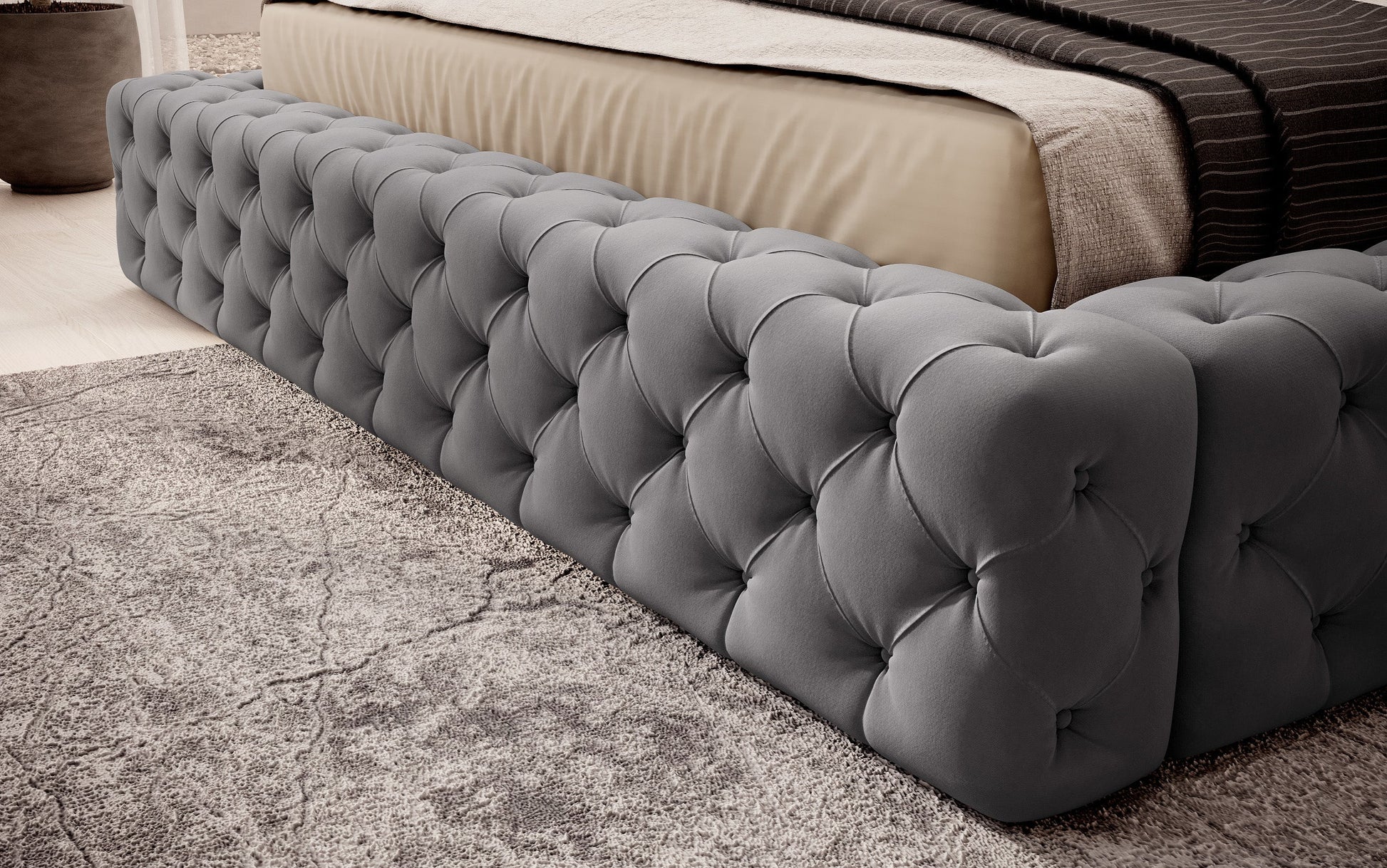 Dolna część łóżka Princce 160x200 Sola 06 szary z pikowanym obiciem i jasną narzutą.