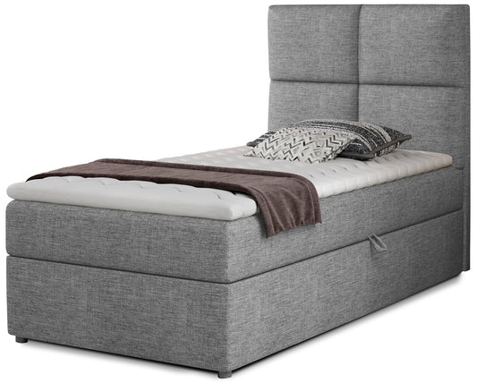 Łóżko Rivia w kolorze Sawana 21 jasny szary o wymiarach 90x200 cm, widok z przodu na białym tle.