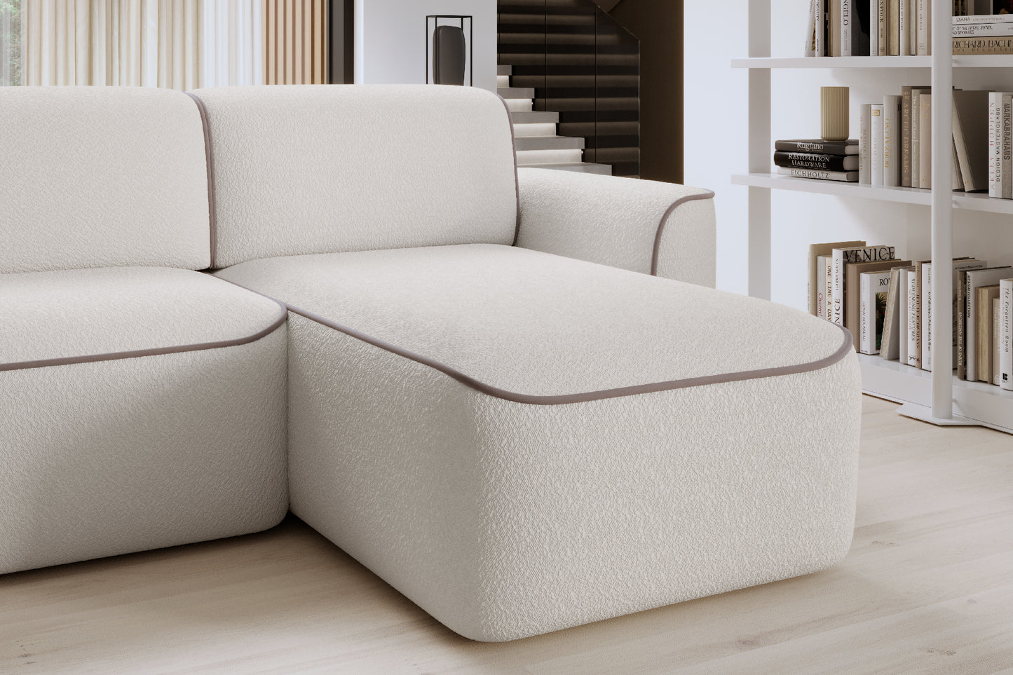 Zbliżenie szezlonga narożnika Ume Royal 01 biały/Paros 02 beżowy, układ prawy na tle jasnej, drewnianej podłogi.