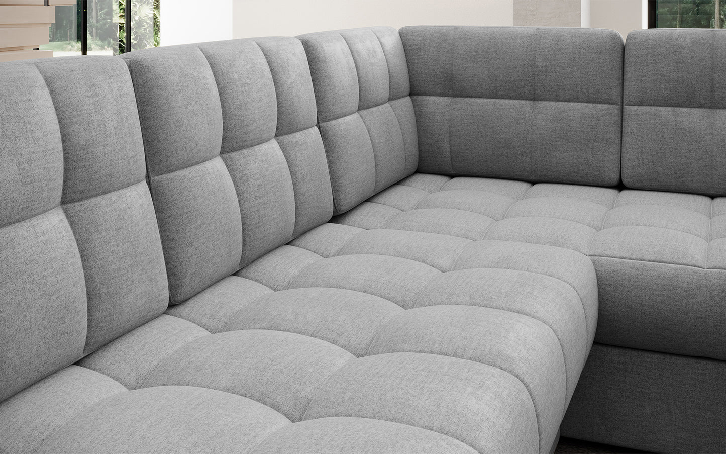 Pikowane siedzisko narożnika w wersji prawej Blewett Monolith 85 szary. Komfortowy i estetyczny detal w modnym stylu wypoczynkowym.