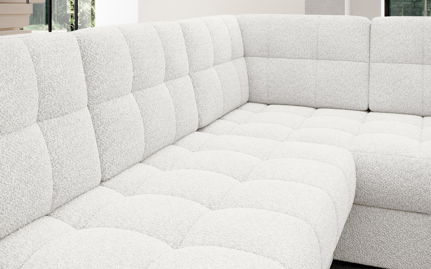 Pikowane siedzisko narożnika w wersji prawej Blewett Royal 01 biały. Komfortowy i estetyczny detal w modnym stylu wypoczynkowym.