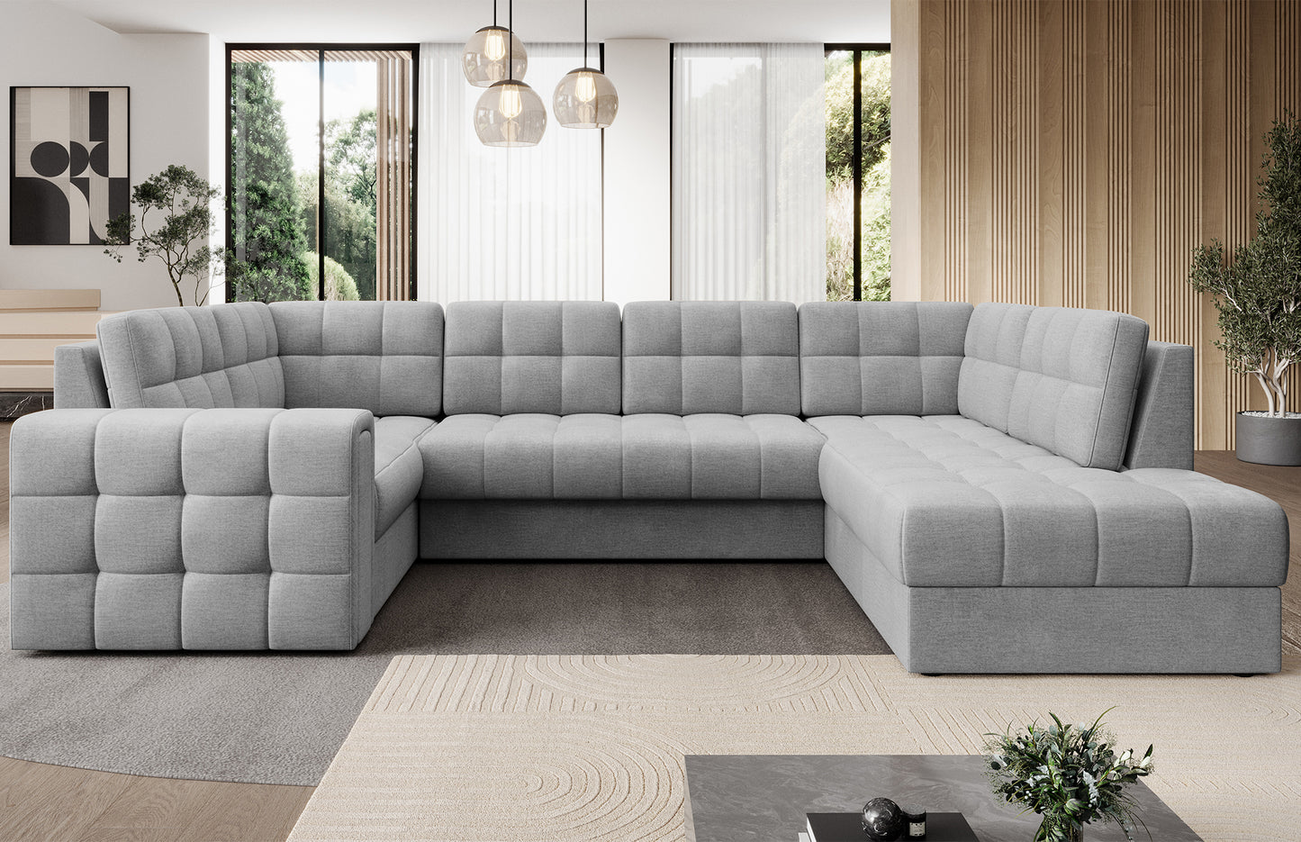 Narożnik w wersji prawej Blewett Monolith 85 szary w eleganckim salonie. Stylowy design, komfort i pikowana tapicerka w nowoczesnym, przytulnym wnętrzu.