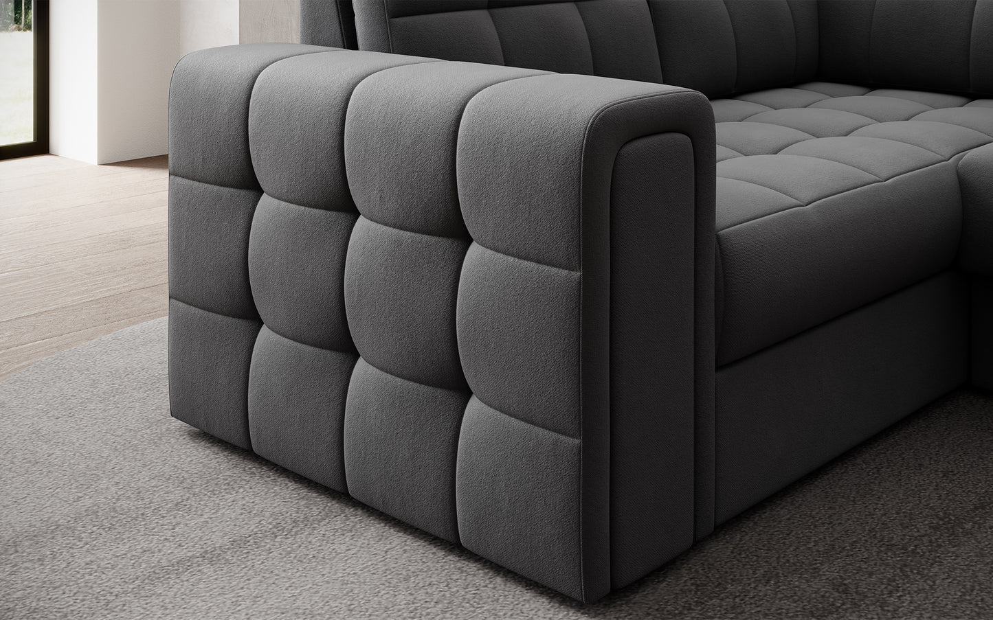 Podłokietnik narożnika w wersji prawej Blewett Sola 06 szary z eleganckim pikowaniem. Detal wykończenia łączący funkcjonalność i styl.