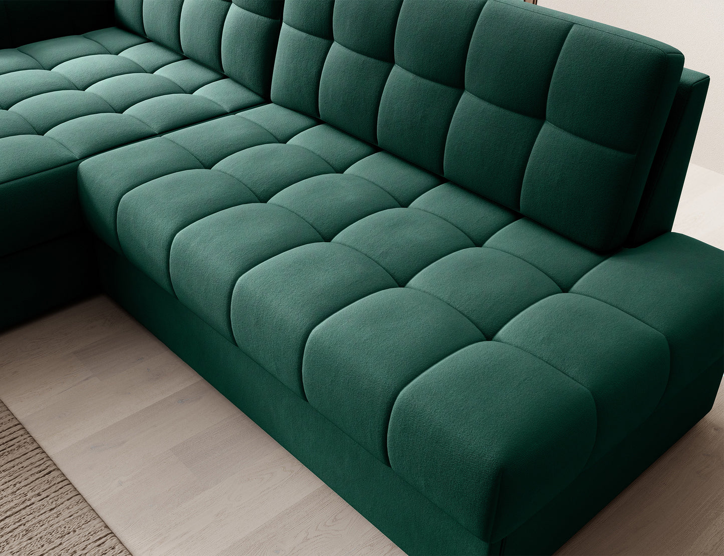 Narożnik Blezalt lewy Lukso 35 w kolorze zielonym – zbliżenie na narożne siedzisko z ozdobnym pikowaniem i miękkim obiciem.