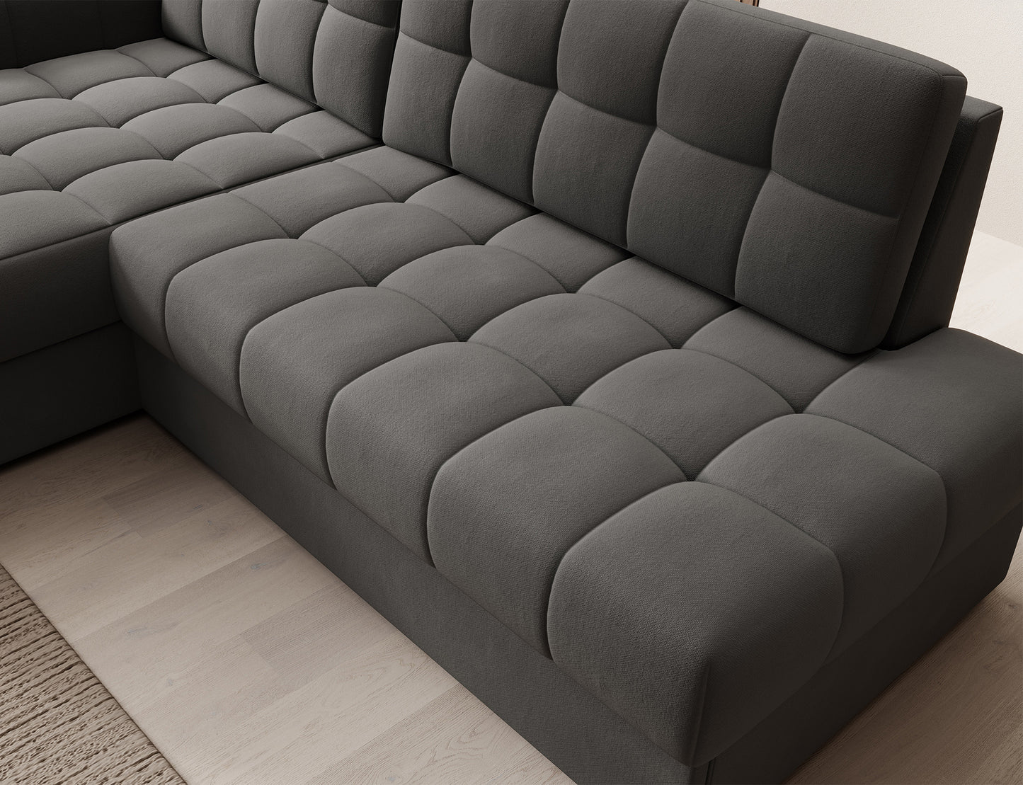 Narożnik Blezalt w szarym kolorze, z pikowanym siedziskiem i oparciem – stylowe wykończenie, idealne do nowoczesnych wnętrz.