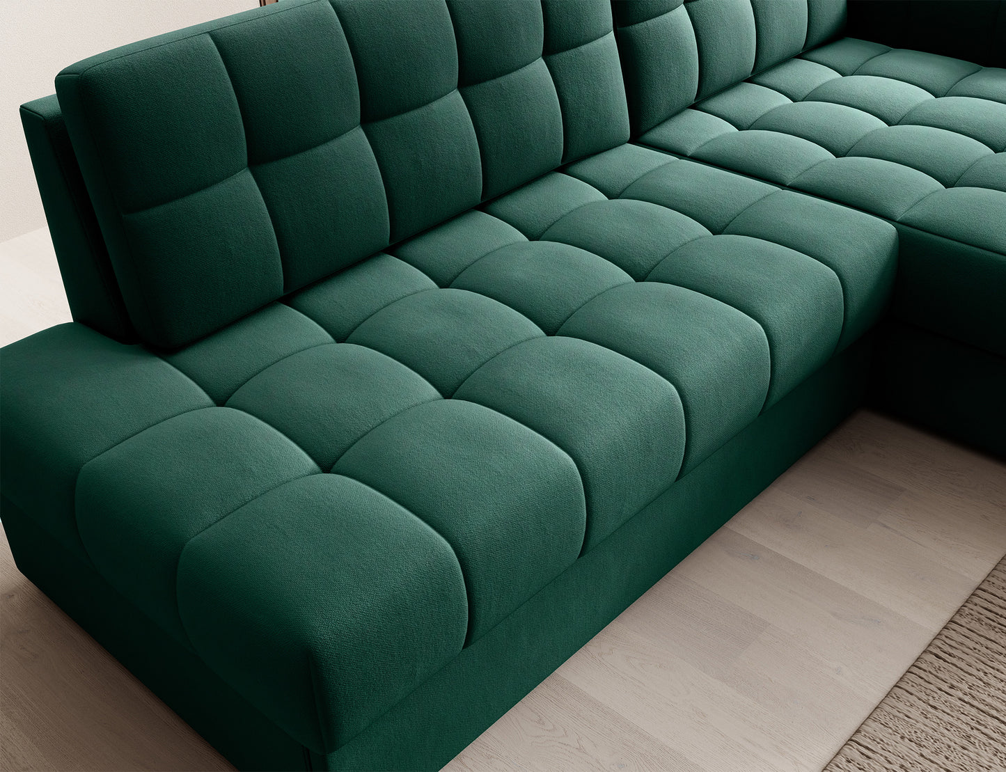 Pikowane siedzisko narożnika Blezalt prawy Lukso 35 w kolorze butelkowej zieleni – ujęcie z góry prezentujące tapicerkę i oparcie.