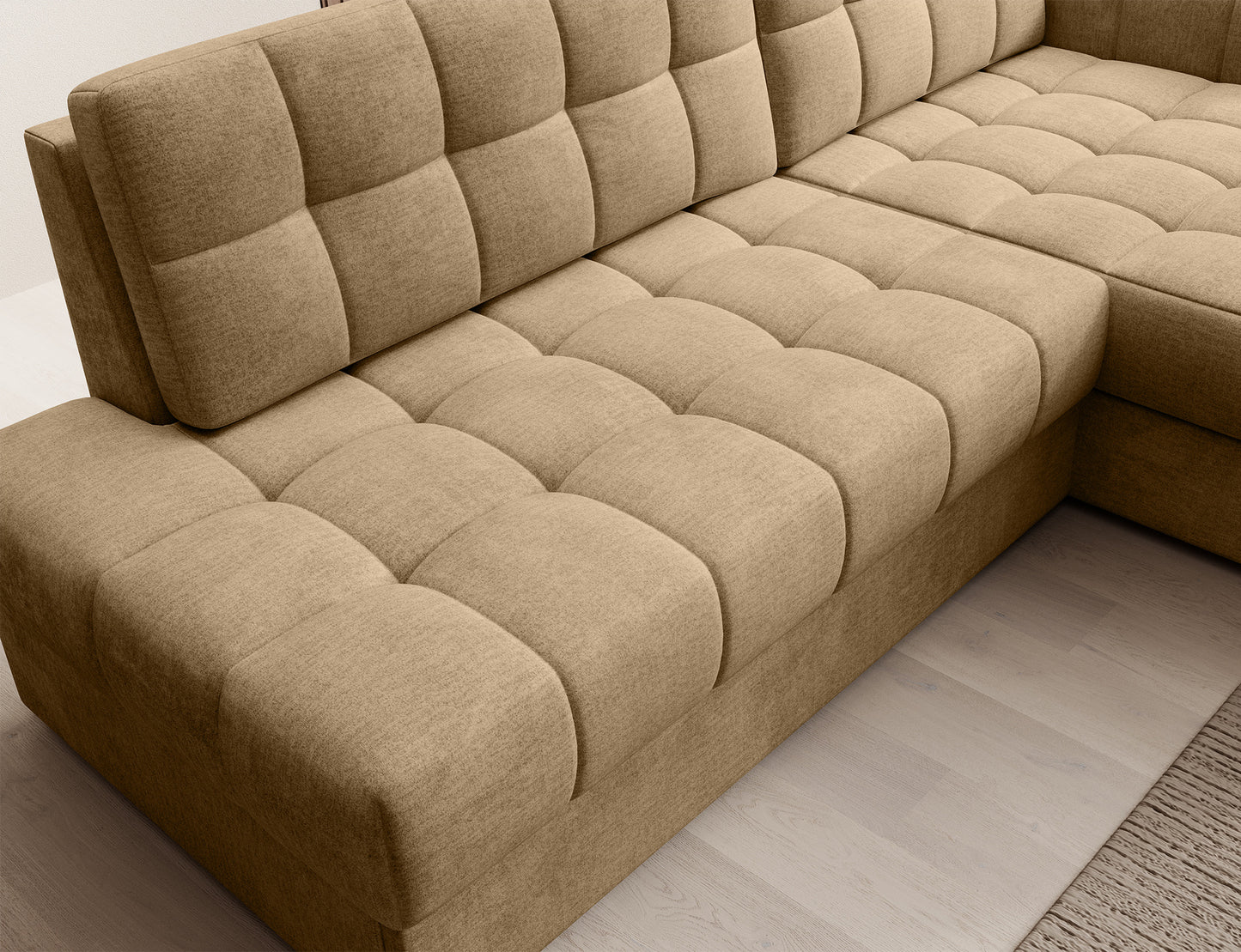 Widok z góry na siedzisko narożnika Blezalt prawy Monolith 09 beżowy – tapicerka z ozdobnym pikowaniem i miękką strukturą.