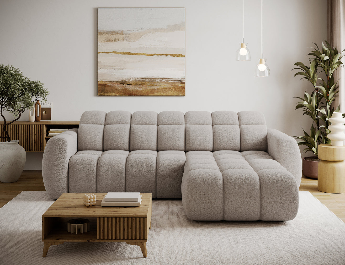Narożnik Fanito prawy w tkaninie Royal 18 kaszmir piaskowy, frontalna aranżacja salonu z szezlongiem i segmentowym oparciem