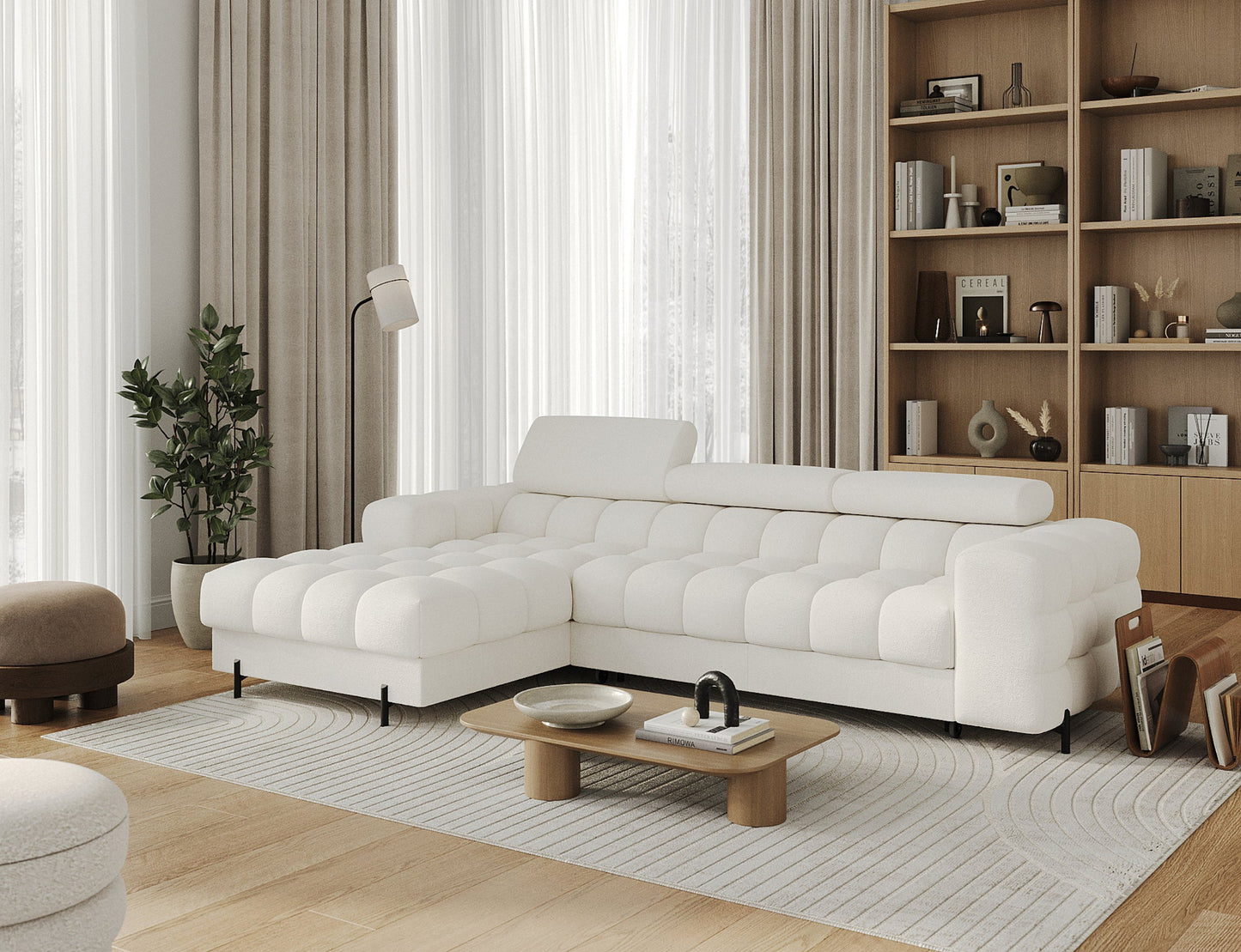 Detal narożnika Ferlo ukazujący funkcję regulacji zagłówków. Komfort dopasowany do indywidualnych potrzeb.