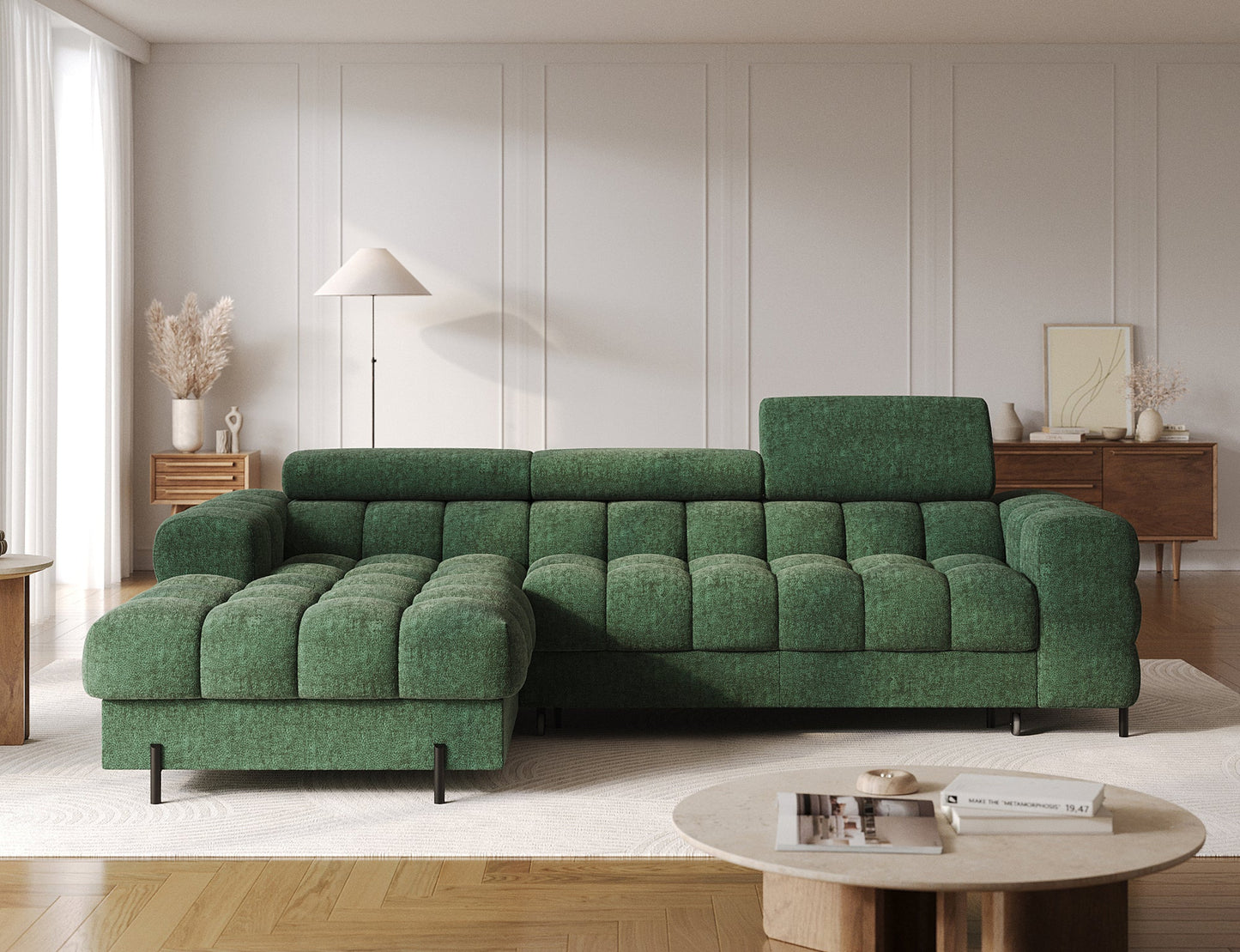 Zielony narożnik Felro z pikowaną tapicerką, widok z przodu. Nowoczesny design i komfortowe siedzisko do eleganckiego salonu.