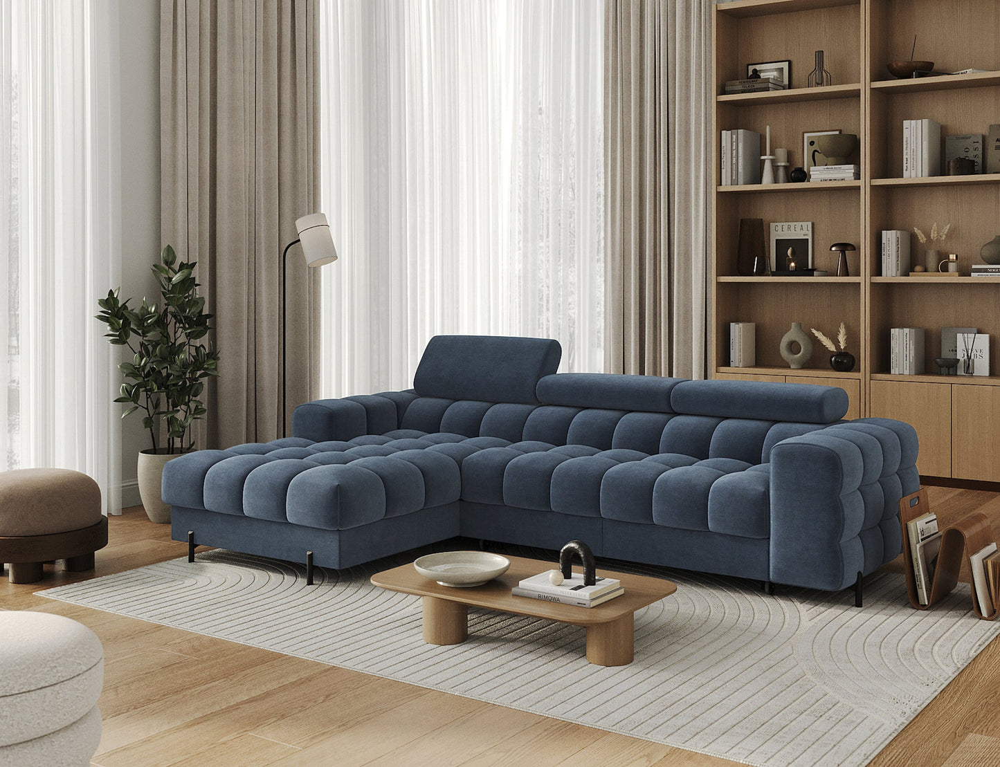 Narożnik Felro w tkaninie Aura 40 w niebieskiej barwie, kreatywna aranżacja, elegancki design z funkcją spania i pojemnikiem na pościel.