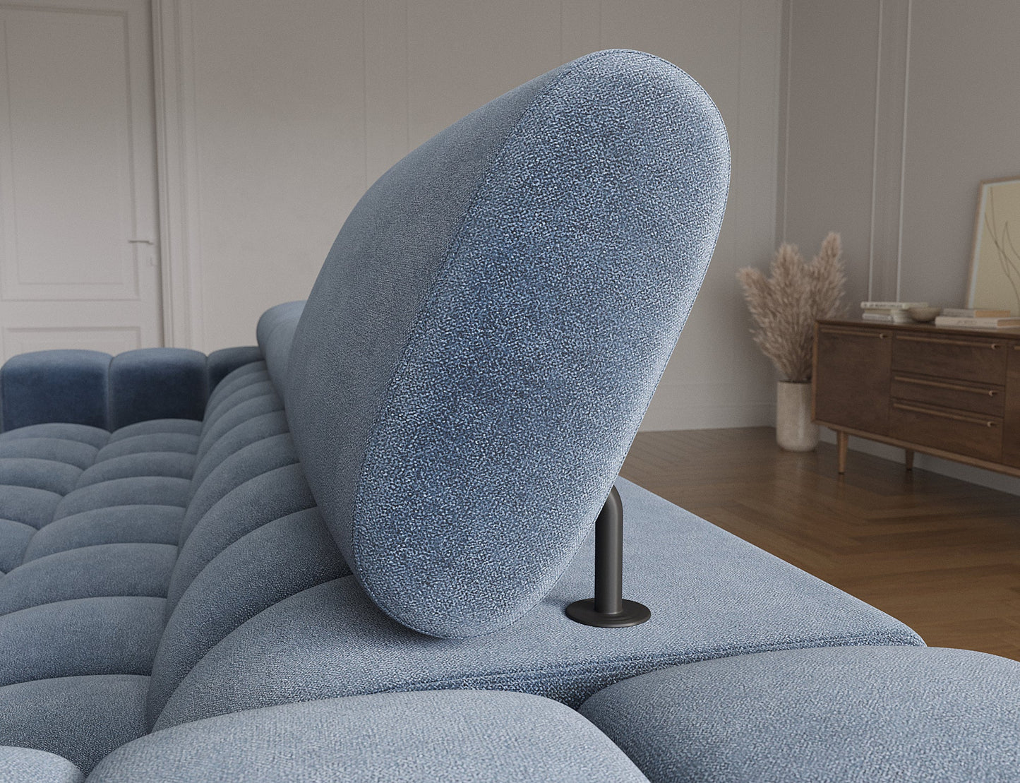 Ruchomy zagłówek narożnika Felro w tkaninie Aura 40 w niebieskiej barwie, zapewniający regulację dla optymalnego komfortu i wsparcia.