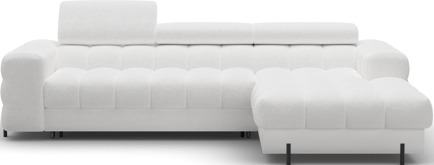 Nowoczesny narożnik Felro w białej barwie, funkcja spania typu Delfin, pojemnik na pościel i elegancka, minimalistyczna sylwetka.