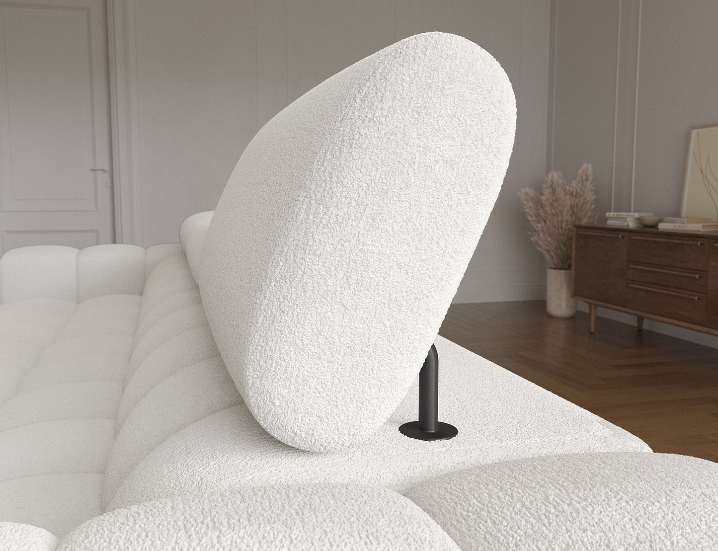 Ruchomy zagłówek narożnika Felro w białej barwie, ergonomiczne wsparcie dla głowy, zapewniające maksymalny komfort podczas wypoczynku.