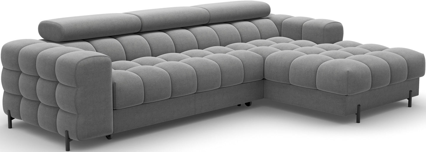 Narożnik Felro w szarym kolorze, elegancki design, ozdobne przeszycia i wygodne siedzisko, stylowe rozwiązanie do nowoczesnych wnętrz.