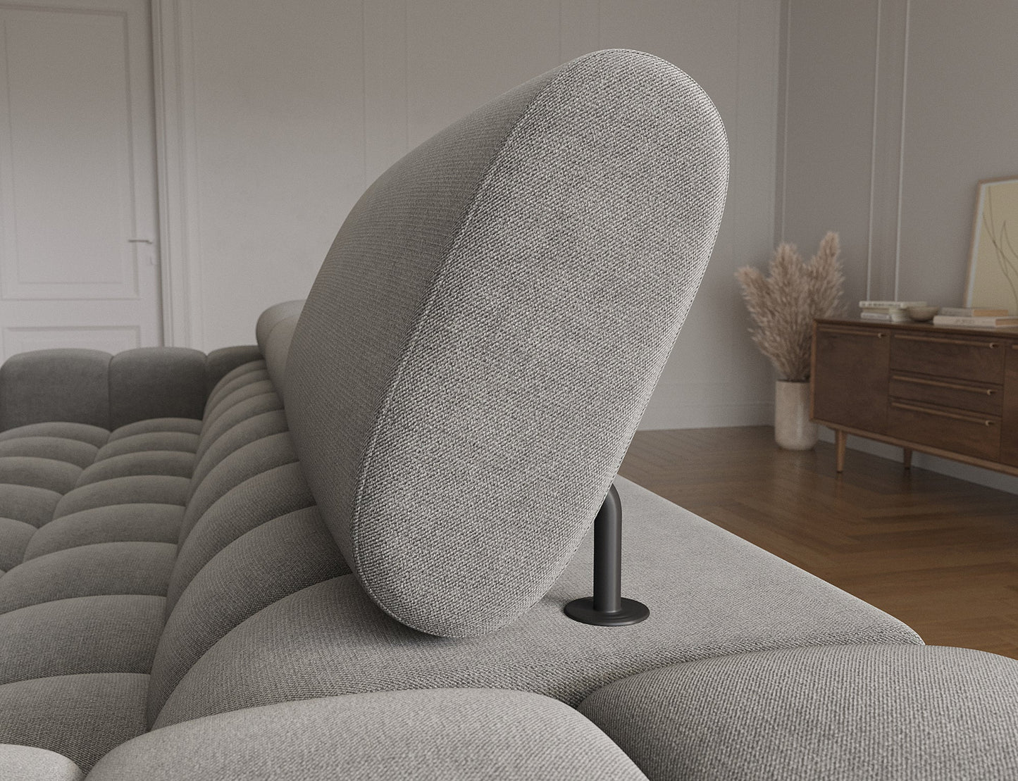 Ruchomy zagłówek narożnika Felro, ergonomiczne wsparcie dla głowy, zapewniające wygodę i dostosowanie do pozycji siedzącej.