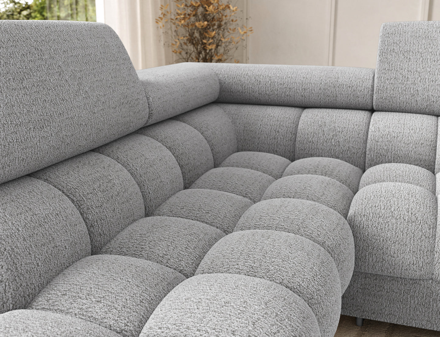 Siedzisko narożnika Feraria lewy w tkaninie Royal 03 jasnoszary – głębokie, miękkie pikowania podkreślające komfort i nowoczesny design.