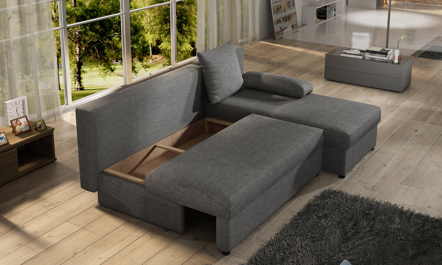 Narożnik Gino w kolorze Sawana 05 ciemnoszary z otwartym pojemnikiem na pościel, w nowoczesnym salonie.