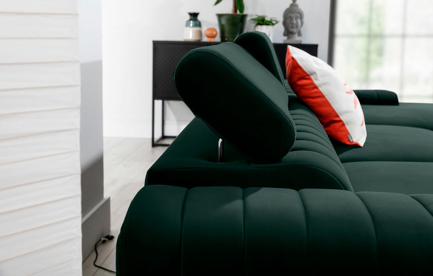 Regulowany zagłówek narożnika Grayson w kolorze Loco 35 zielony – detal pokazujący wygodne oparcie i wysoką jakość wykonania.