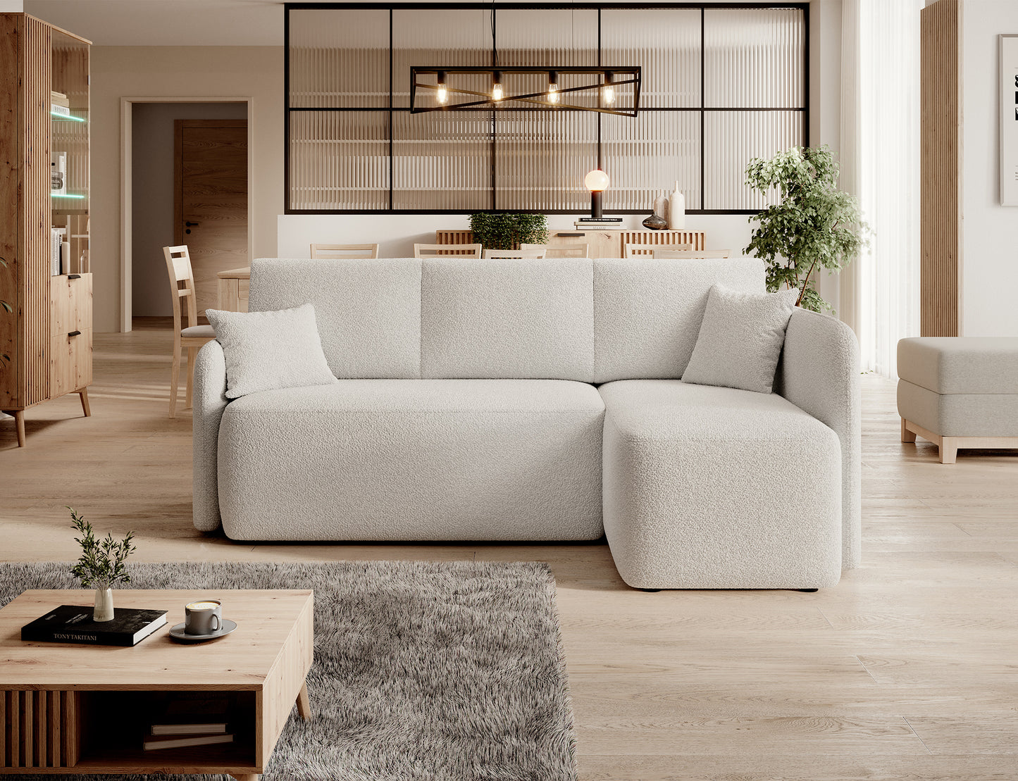 Narożnik w otwartym wnętrzu z salonem i aneksem kuchennym – styl skandynawski Home and Garden.