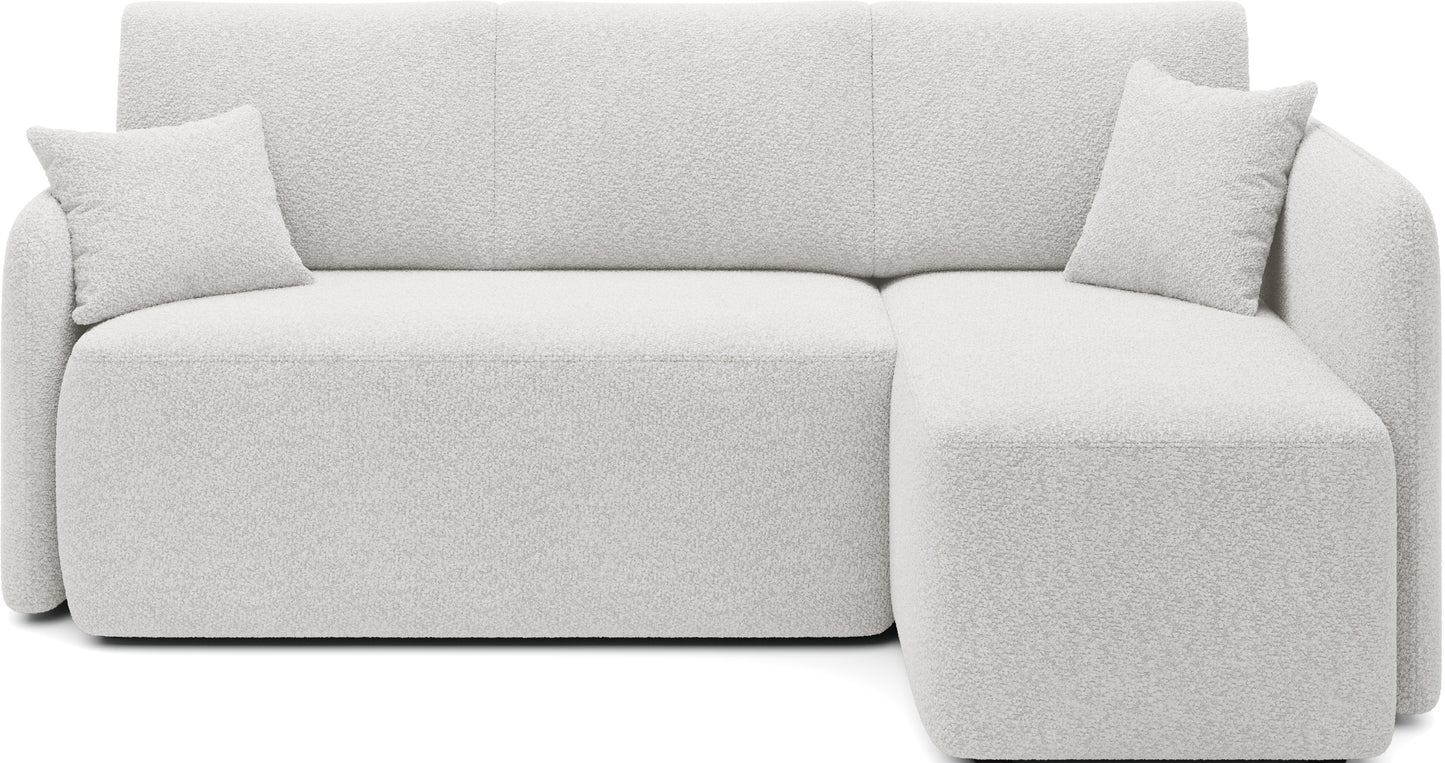 Prosty narożnik z funkcją wypoczynkową, minimalistyczna sofa z poduchami.