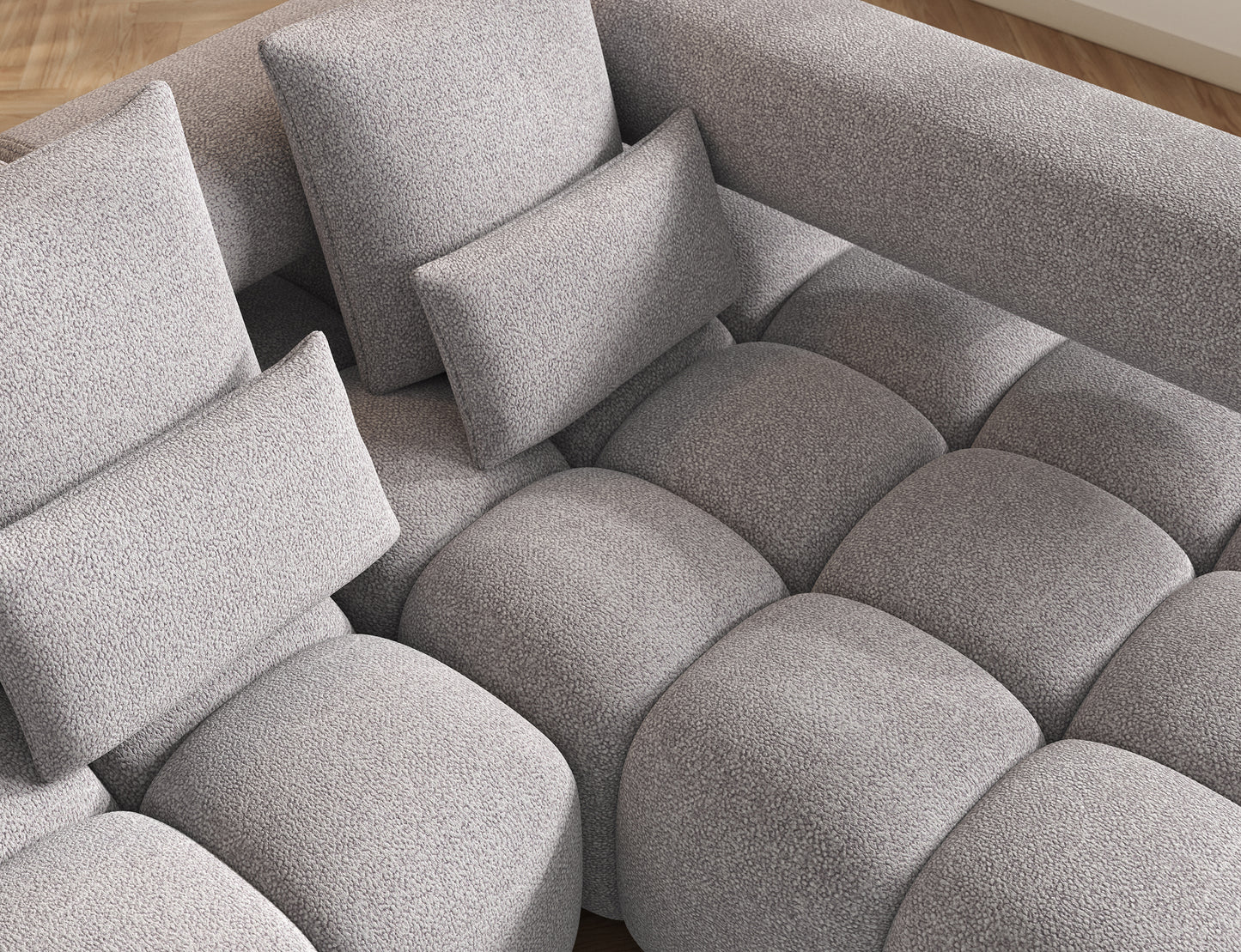 Szczegół tkaniny narożnika Levvi w odcieniu Paolli 04 szary – wysoka jakość i elegancka struktura materiału.