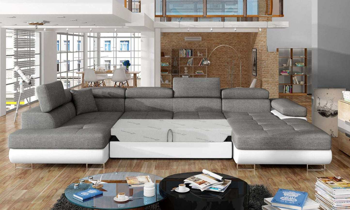 Narożnik Rodrigo Sawana 05 ciemnoszary / Soft 17 w układzie lewym z rozłożoną funkcją spania w jasnym salonie.