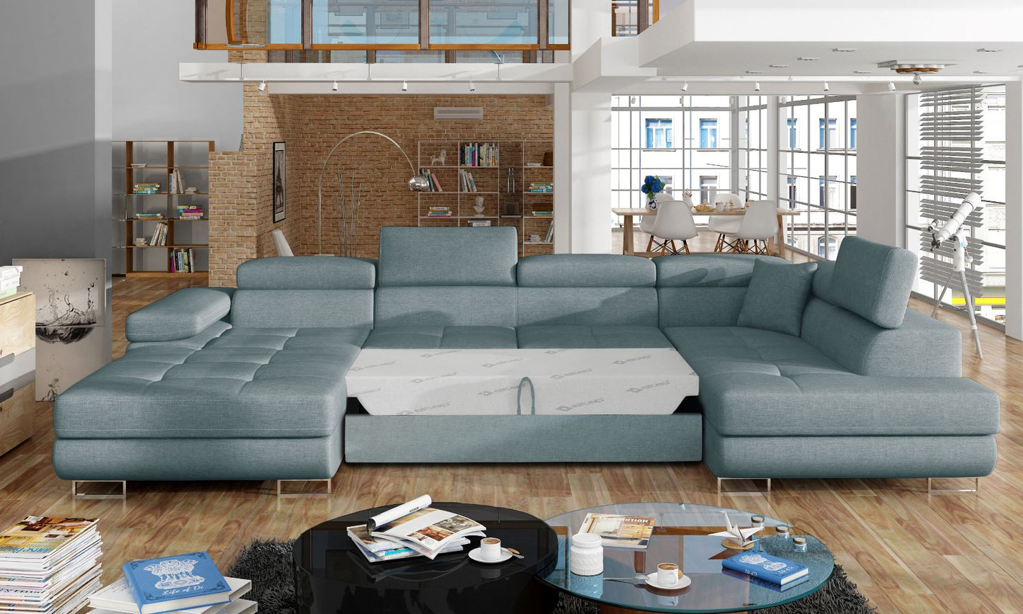 Narożnik Rodrigo Cover 70 niebieski w układzie prawym z rozłożoną funkcją spania w jasnym salonie.