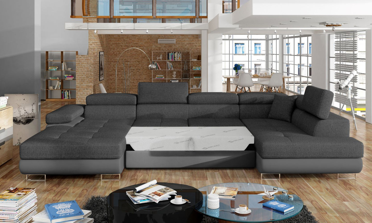 Narożnik Rodrigo Inari 96 ciemnoszary / Soft 29 w układzie prawym z rozłożoną funkcją spania w jasnym salonie.