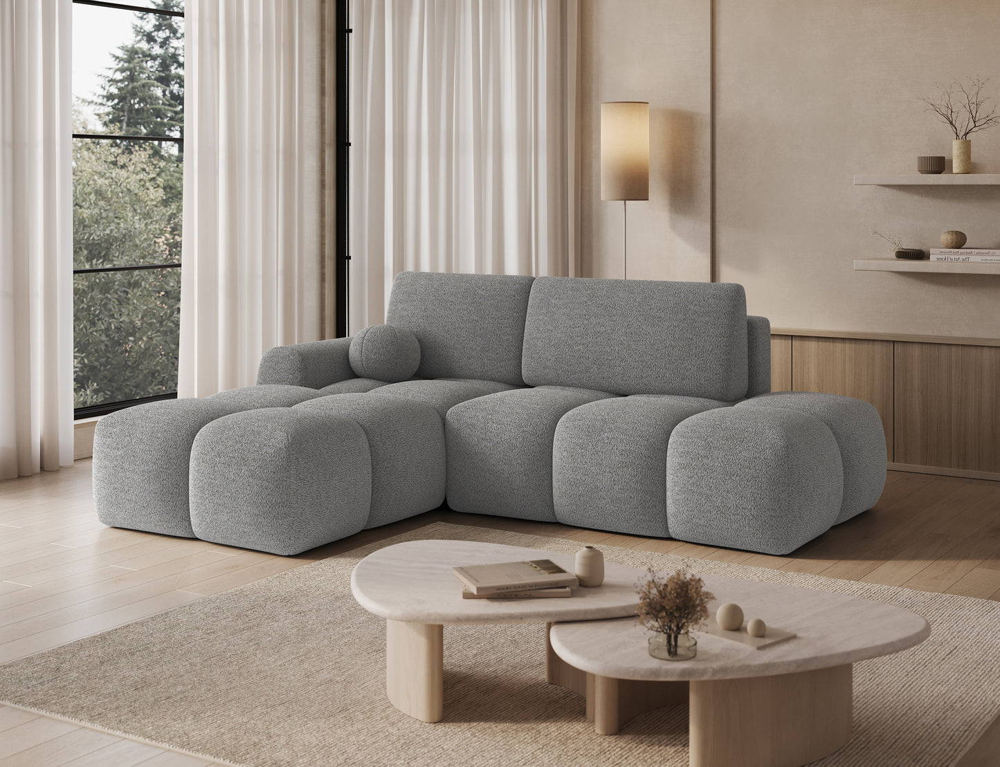 Designerski narożnik Vittario lewy w kolorze Royal 04 jasny stalowy w jasnym wnętrzu, miękkie bryły i nowoczesna forma modułowa.
