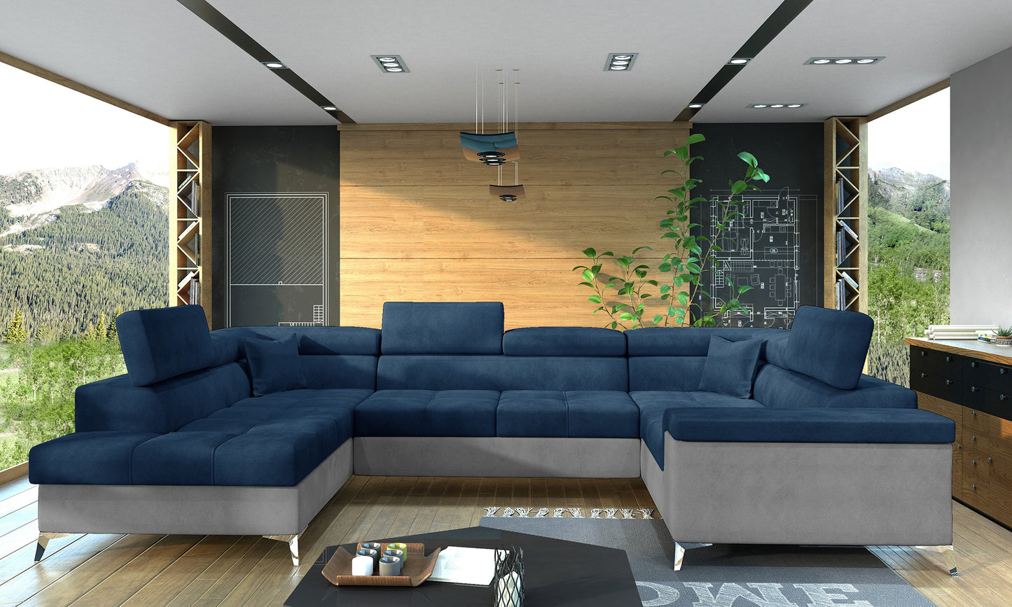 Komfortowy narożnik Thiago w połączeniu koloru niebieskiego i szarego doskonale pasuje do nowoczesnych aranżacji wnętrz i przestronnych salonów. Duży narożnik z funkcją relaksu oferuje wygodne miejsce do odpoczynku, spotkań z rodziną oraz wieczornego relaksu.