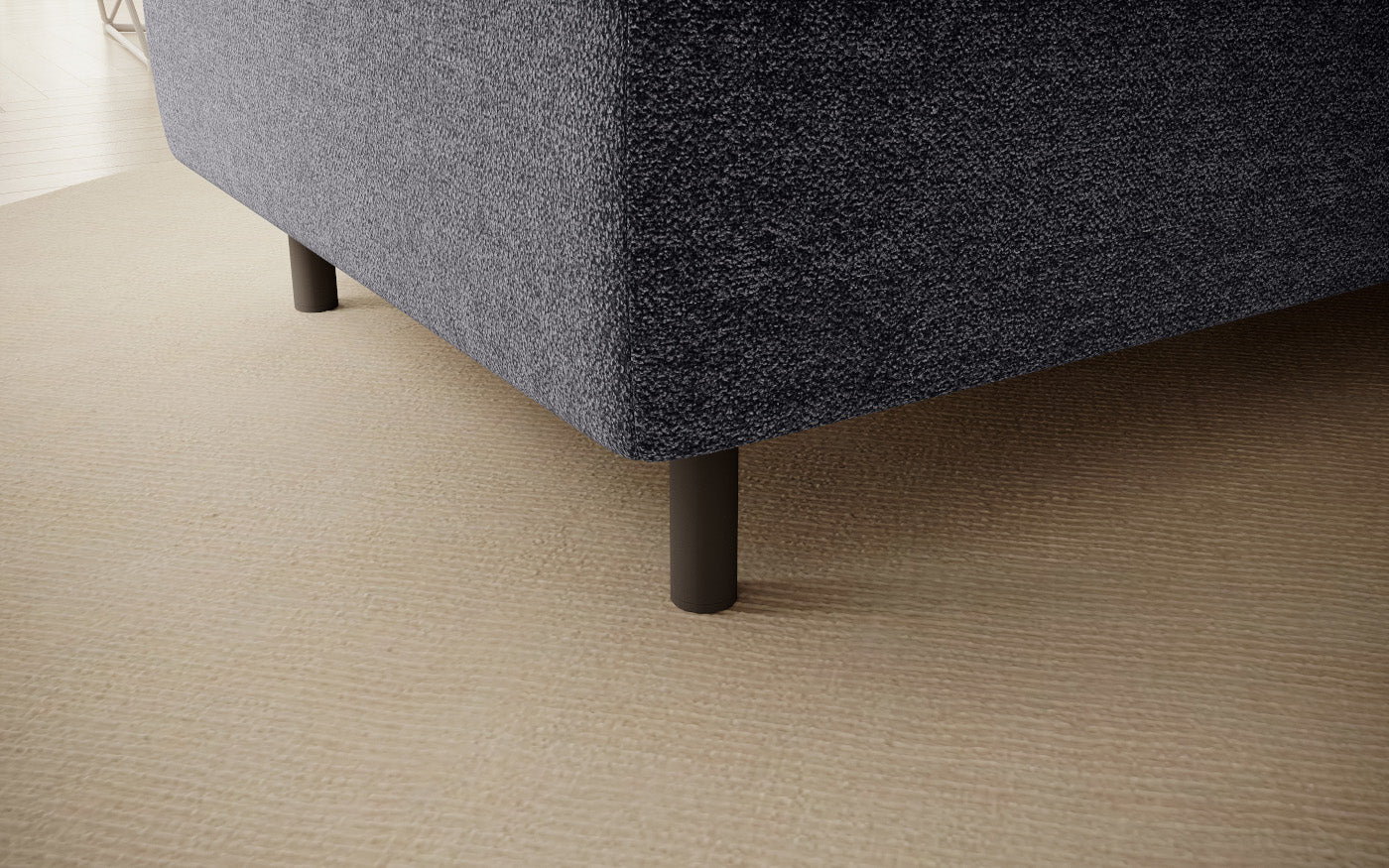 Pufa do siedzenia, prostokątna, szara z przeszyciami.