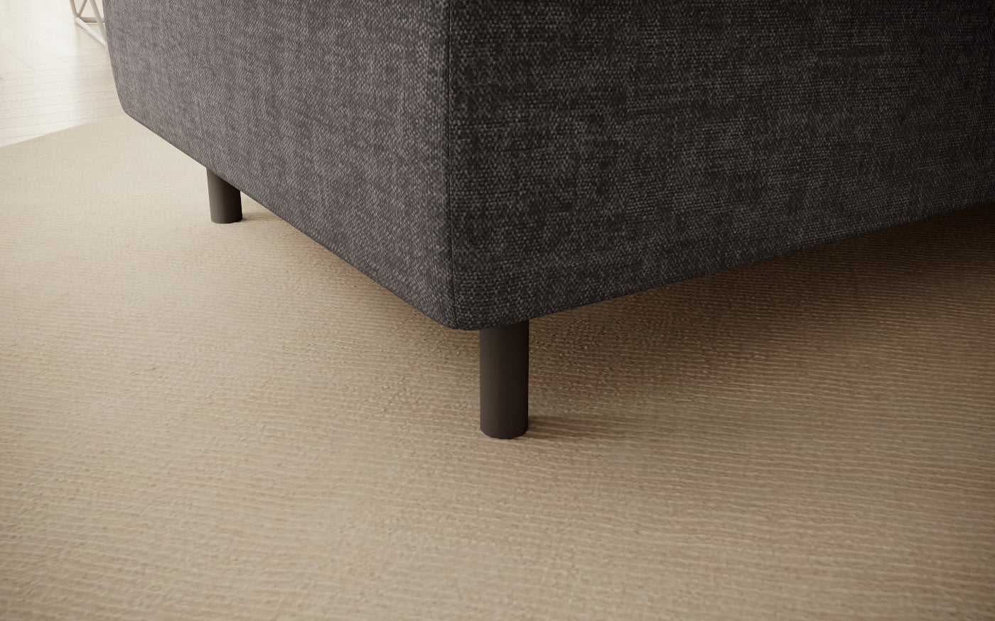 Pufa do siedzenia, prostokątna, szara z przeszyciami, detal nóżek.