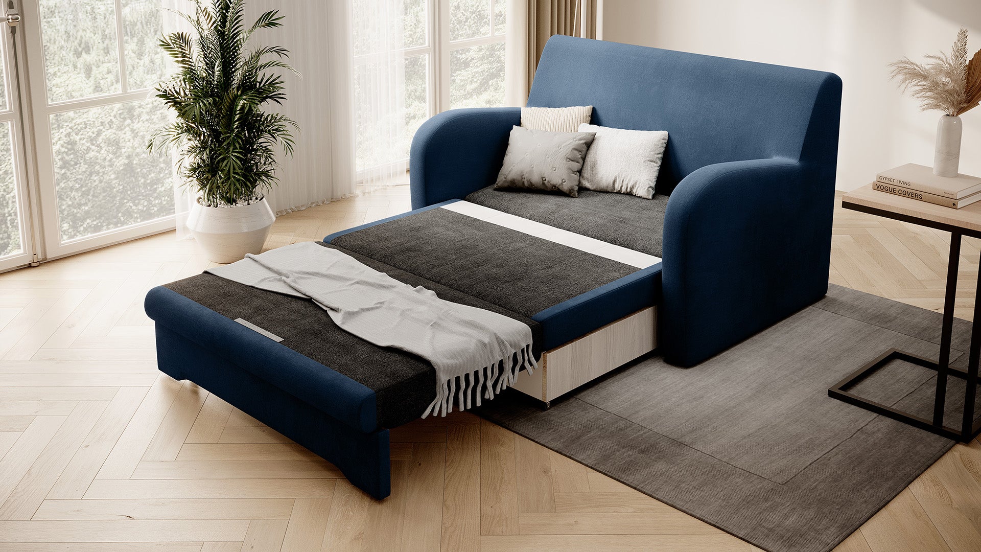Granatowa sofa Ario w gładkiej tkaninie, rozłożona do spania, ujęcie skośne w salonie na dywanie, obok okna z rośliną i stolika.